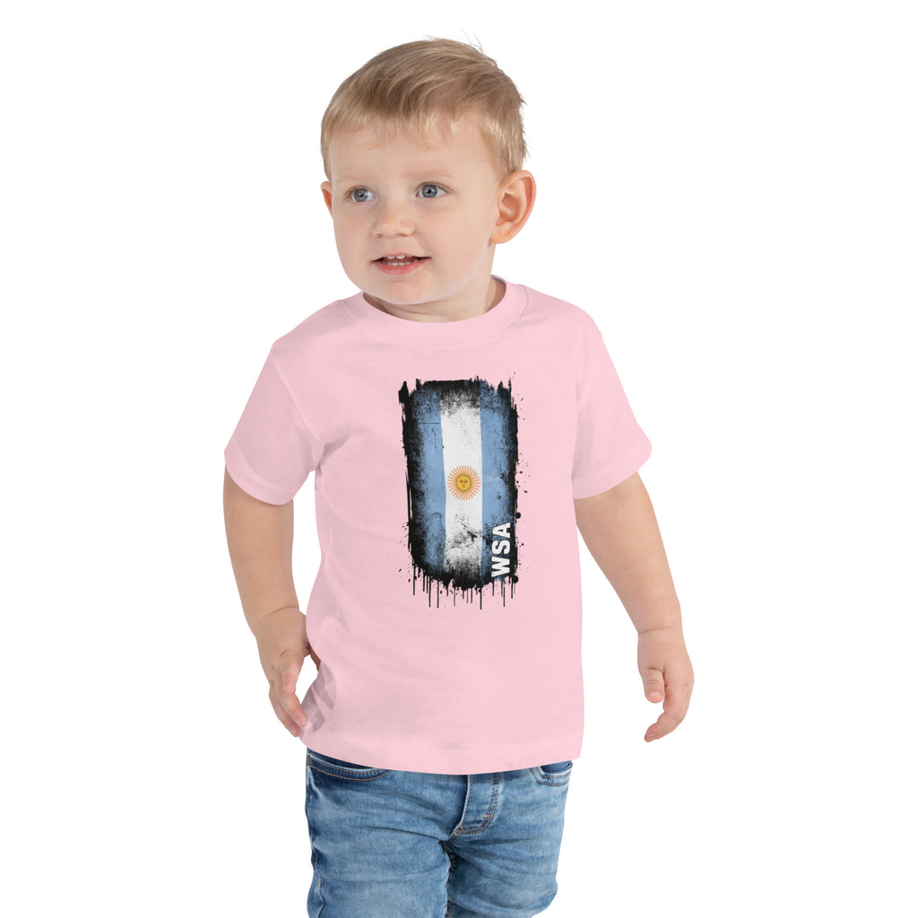 Child wearing a pink t-shirt with an Argentina flag design on a white background