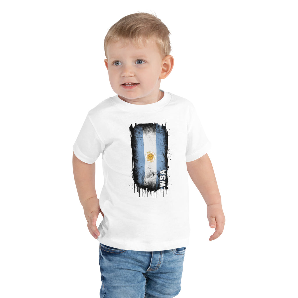 Child wearing a white t-shirt with an Argentina flag design on a white background