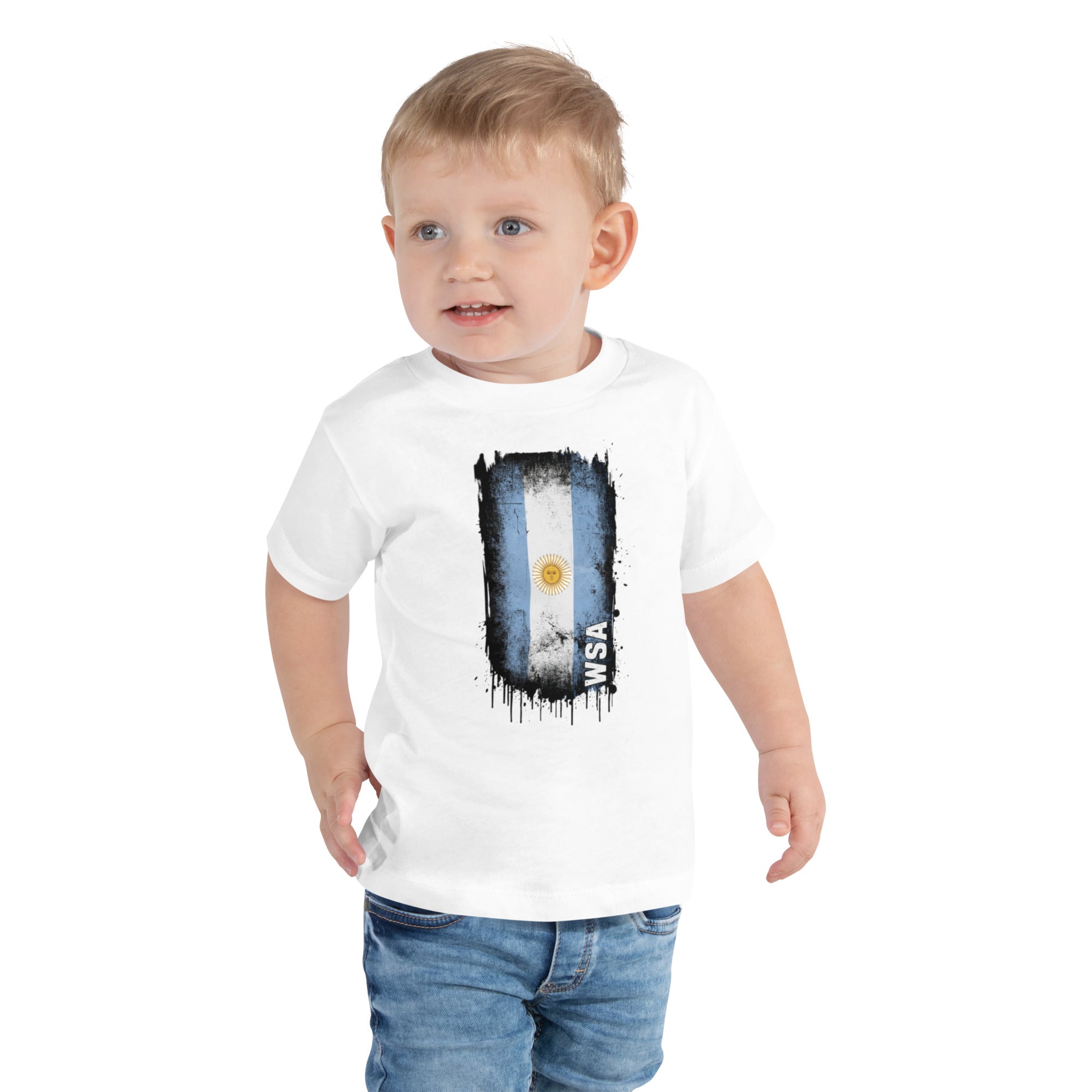 Child wearing a white t-shirt with an Argentina flag design on a white background