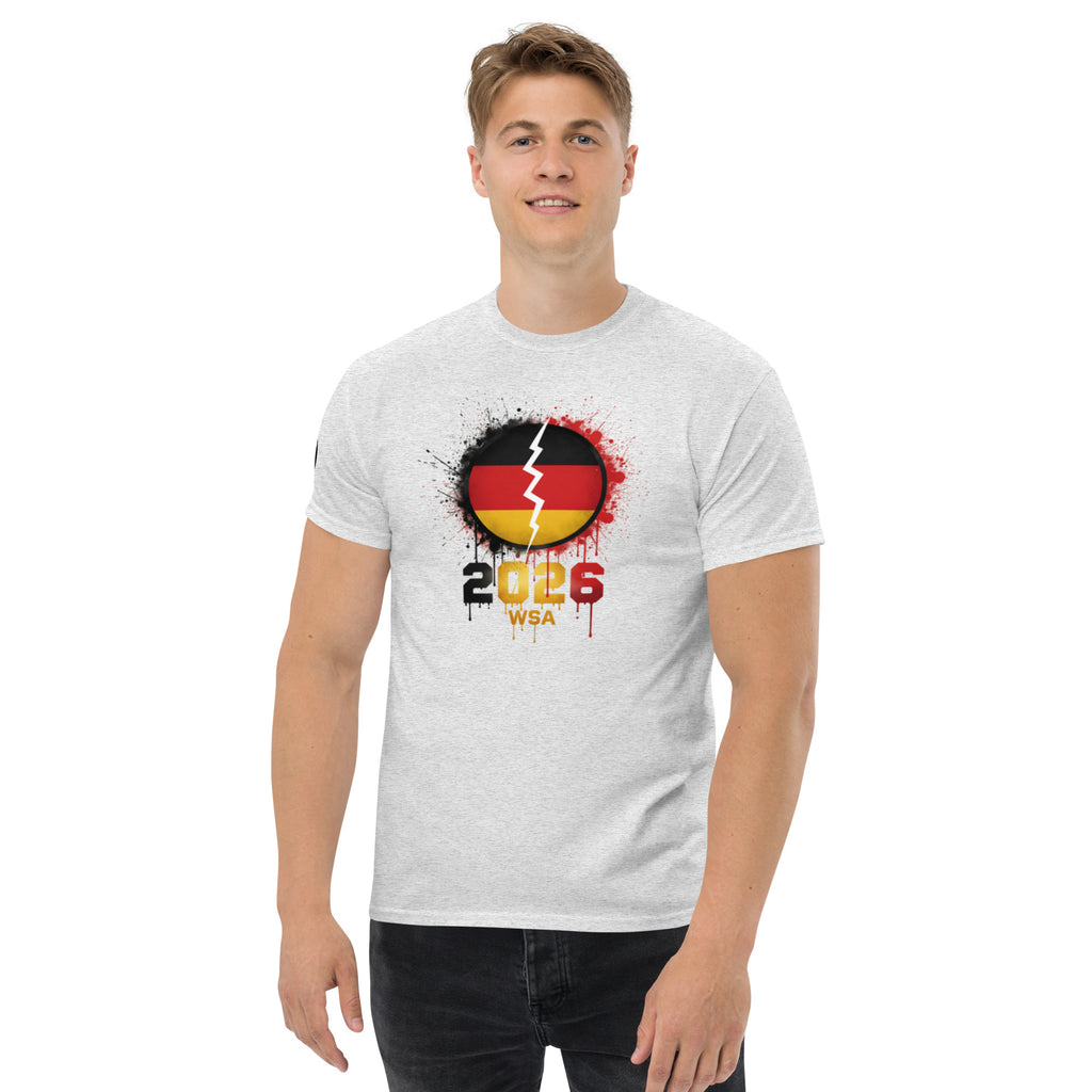 Person wearing a white t-shirt with a design featuring the number 2026 and text on a white background