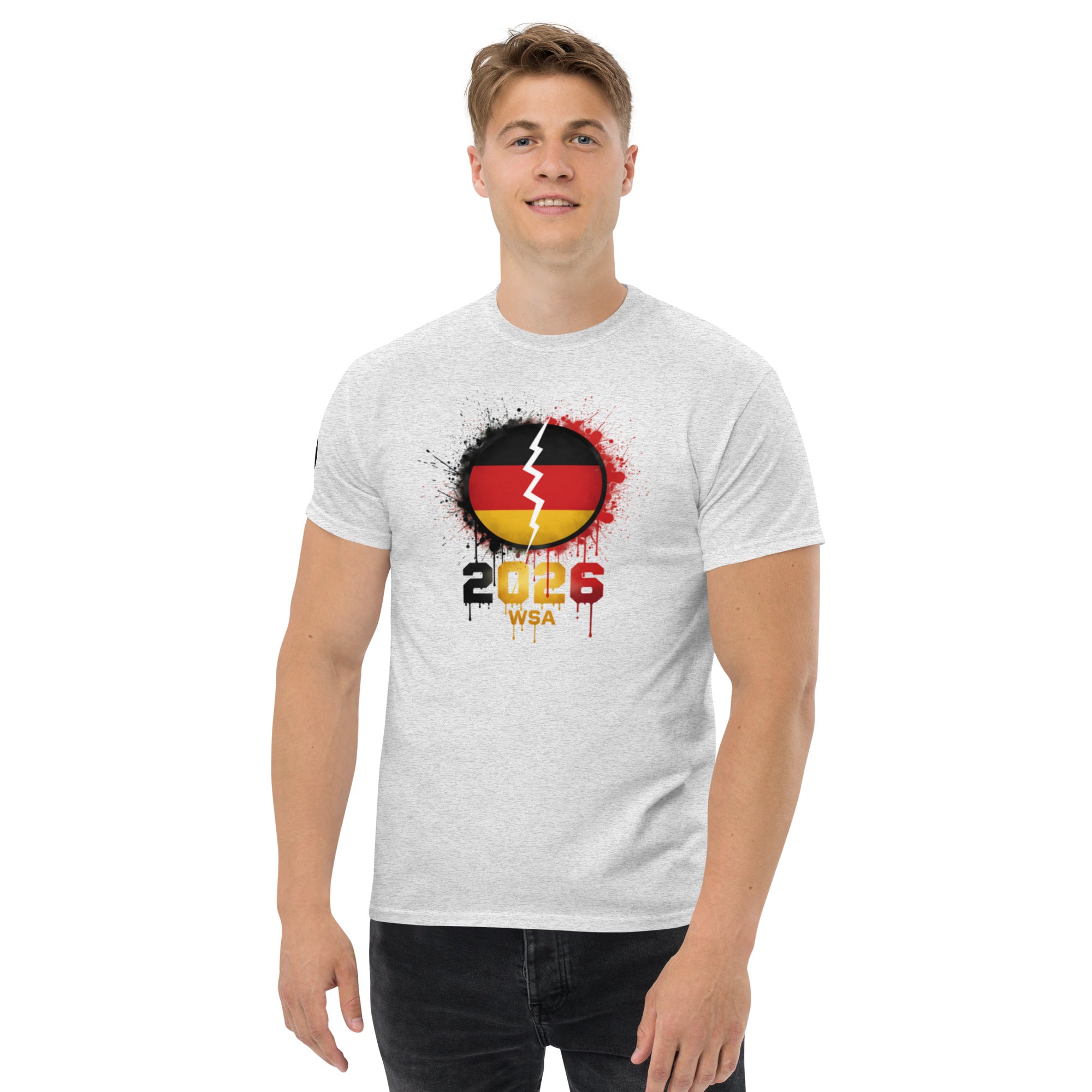 Person wearing a white t-shirt with a design featuring the number 2026 and text on a white background