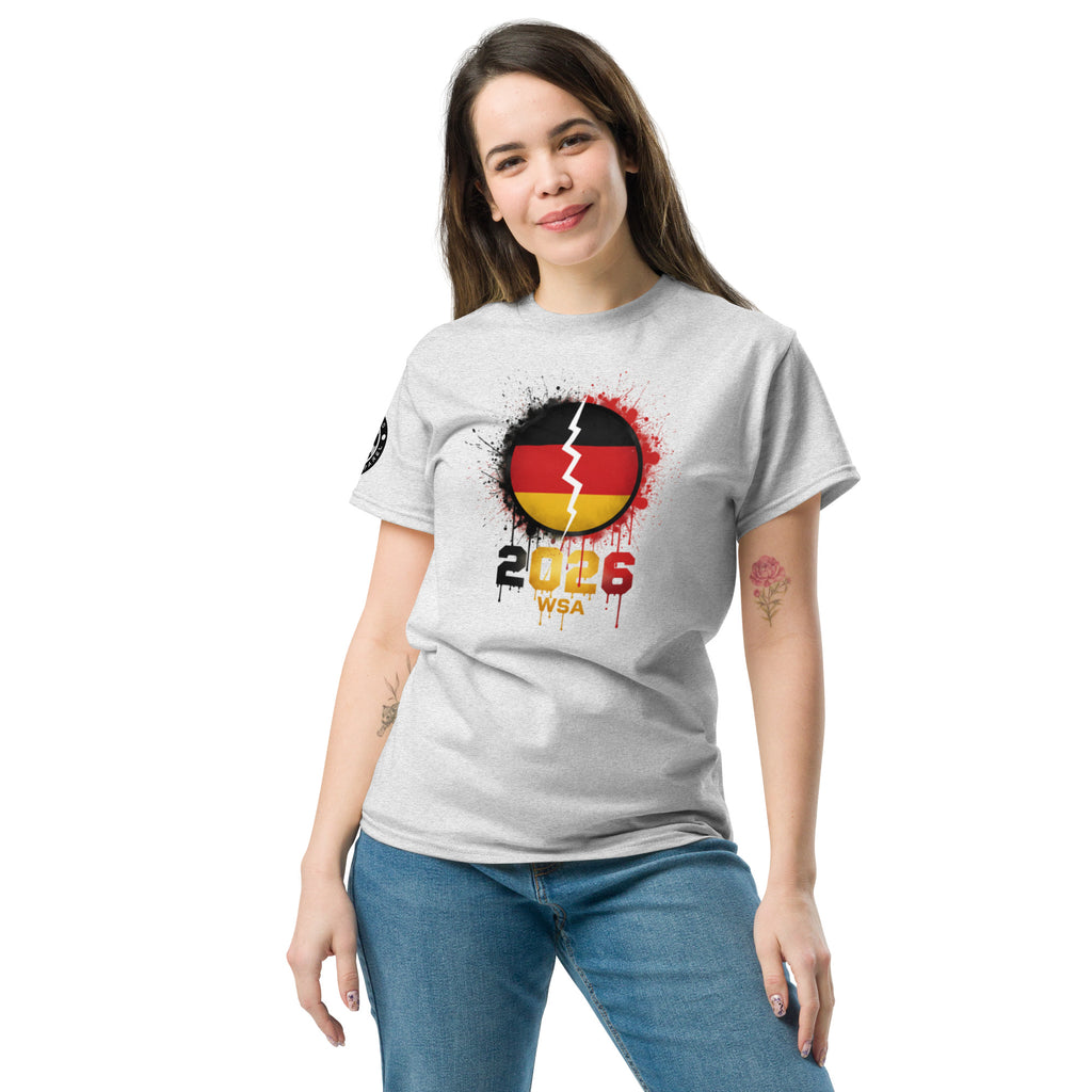 Woman wearing a white t-shirt with a design featuring the number 2026 and text on a white background
