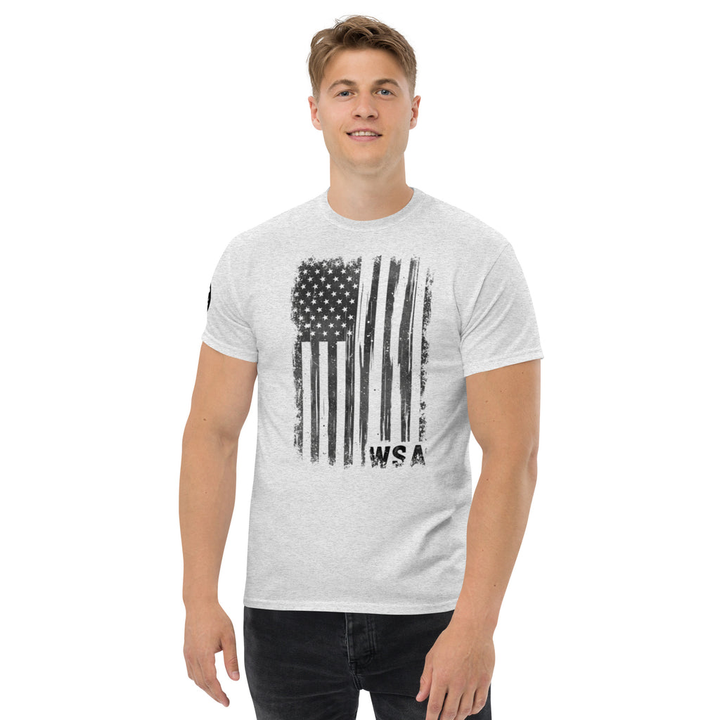 Man wearing a white t-shirt with a black American flag design on a white background