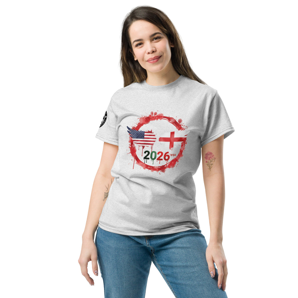 Woman wearing a white t-shirt with a design featuring flags and the number 2026 on a white background