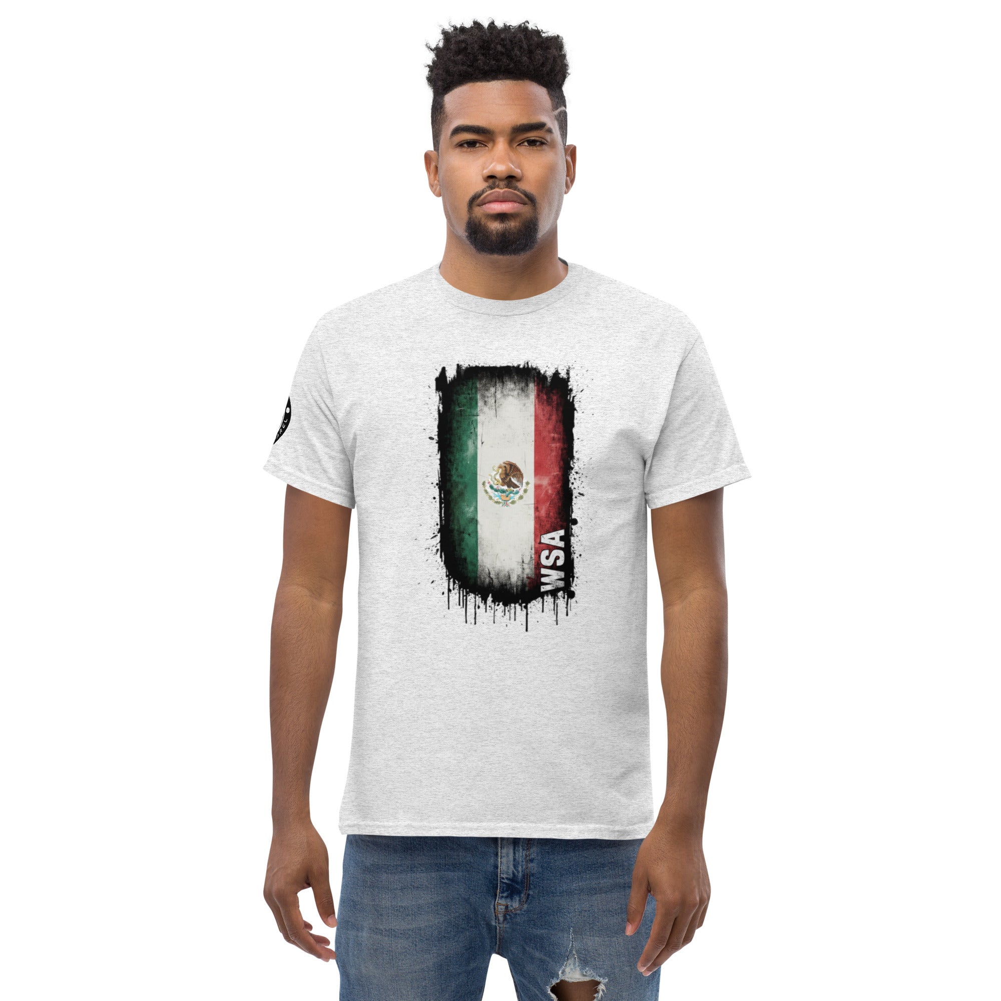 Man wearing a white t-shirt with a graphic design on a white background