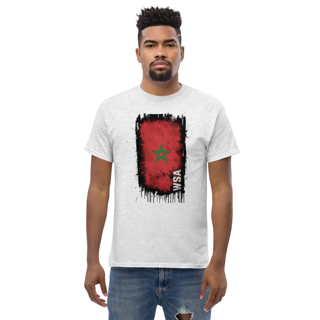 Man wearing a white t-shirt with a red and black graphic design on a white background