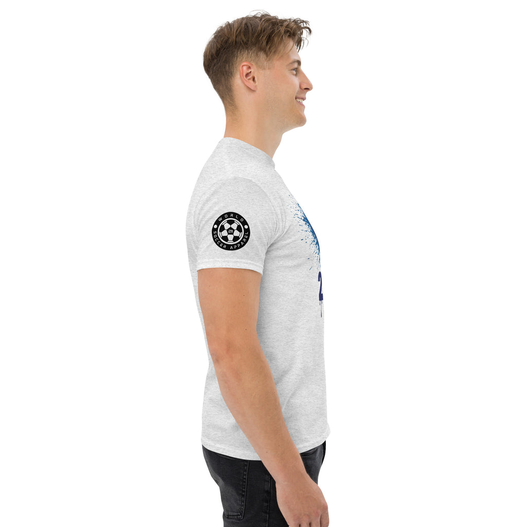 Man wearing a white t-shirt with a logo on the sleeve against a white background
