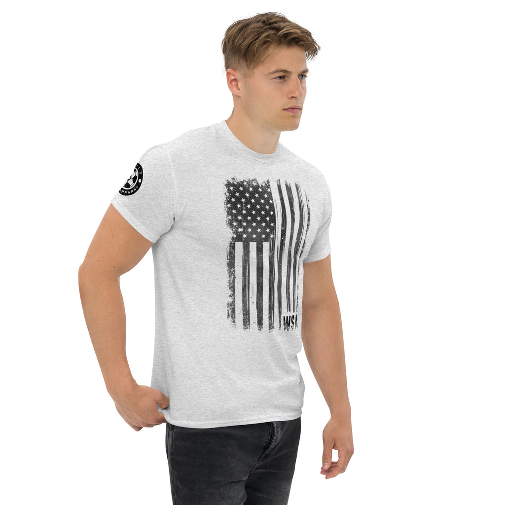 Man wearing a gray t-shirt with an American flag design on a white background