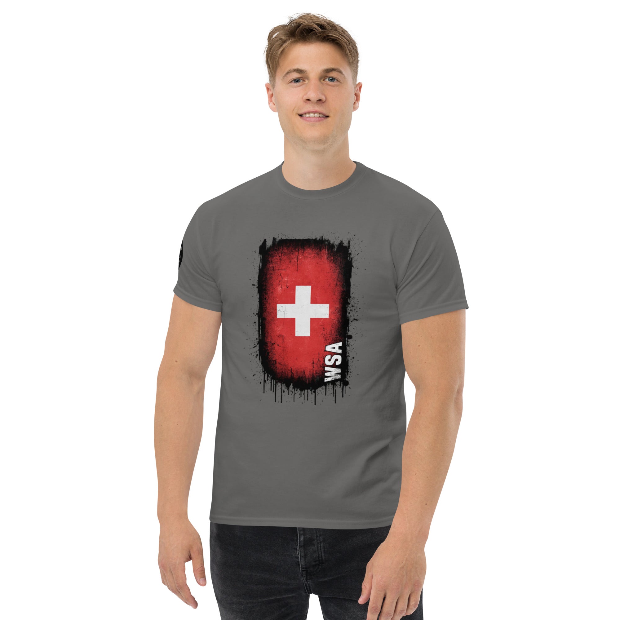 Man wearing a gray t-shirt with a red and black graphic design on a white background