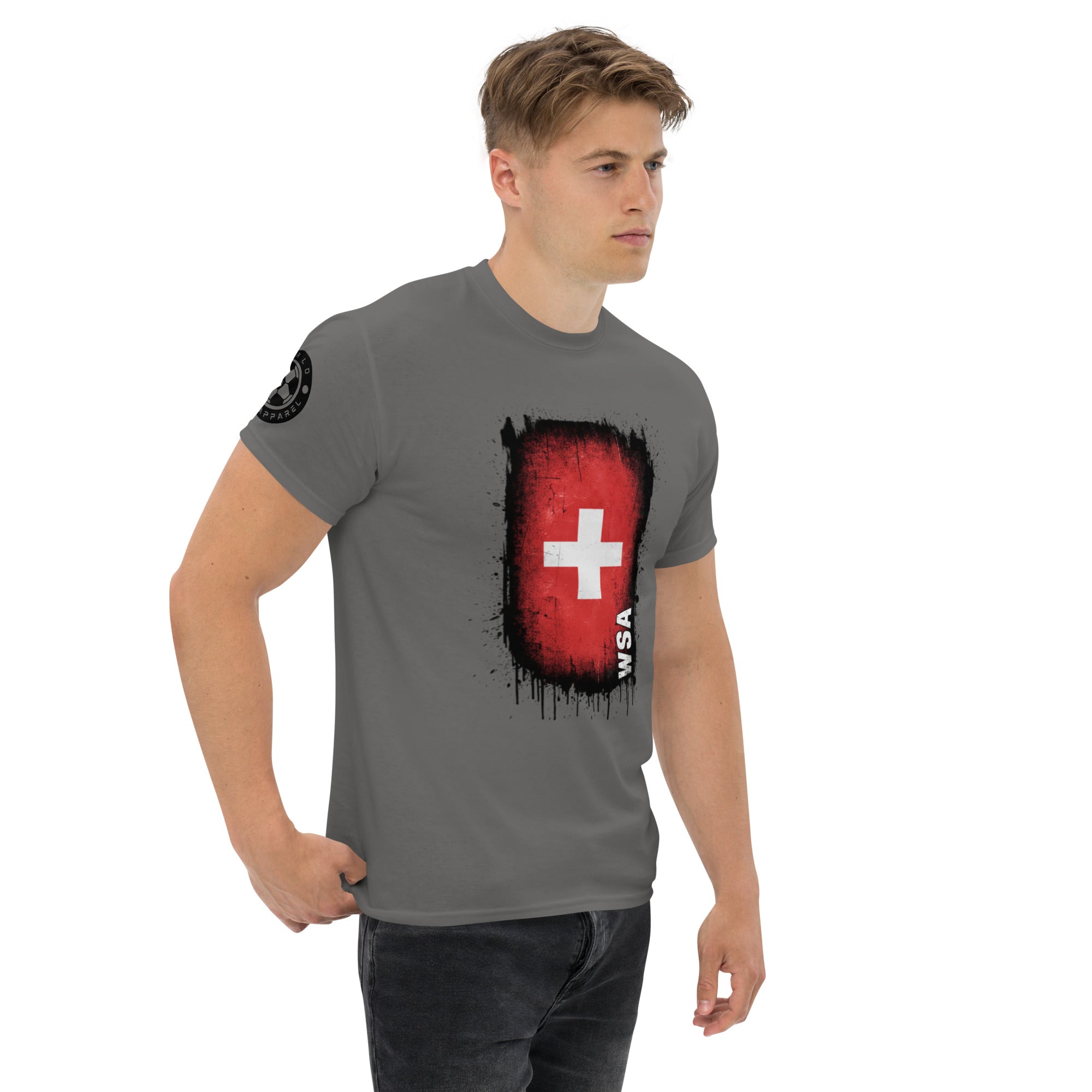 Man wearing a gray t-shirt with a red and black graphic design on a white background