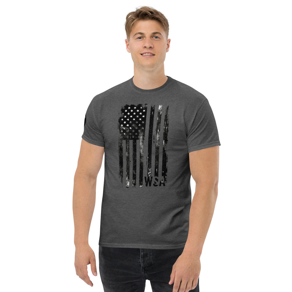 Man wearing a gray t-shirt with an American flag design on a white background