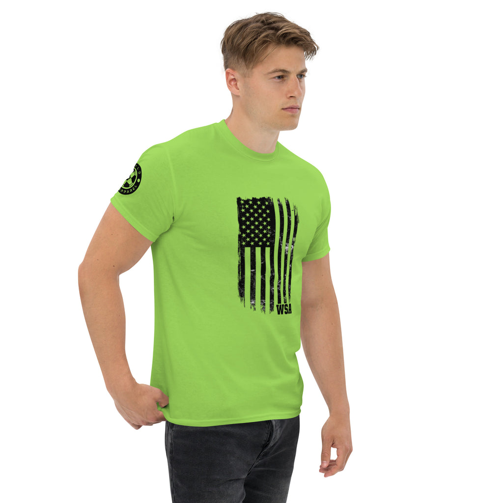 Man wearing a bright green t-shirt with an American flag design on a white background