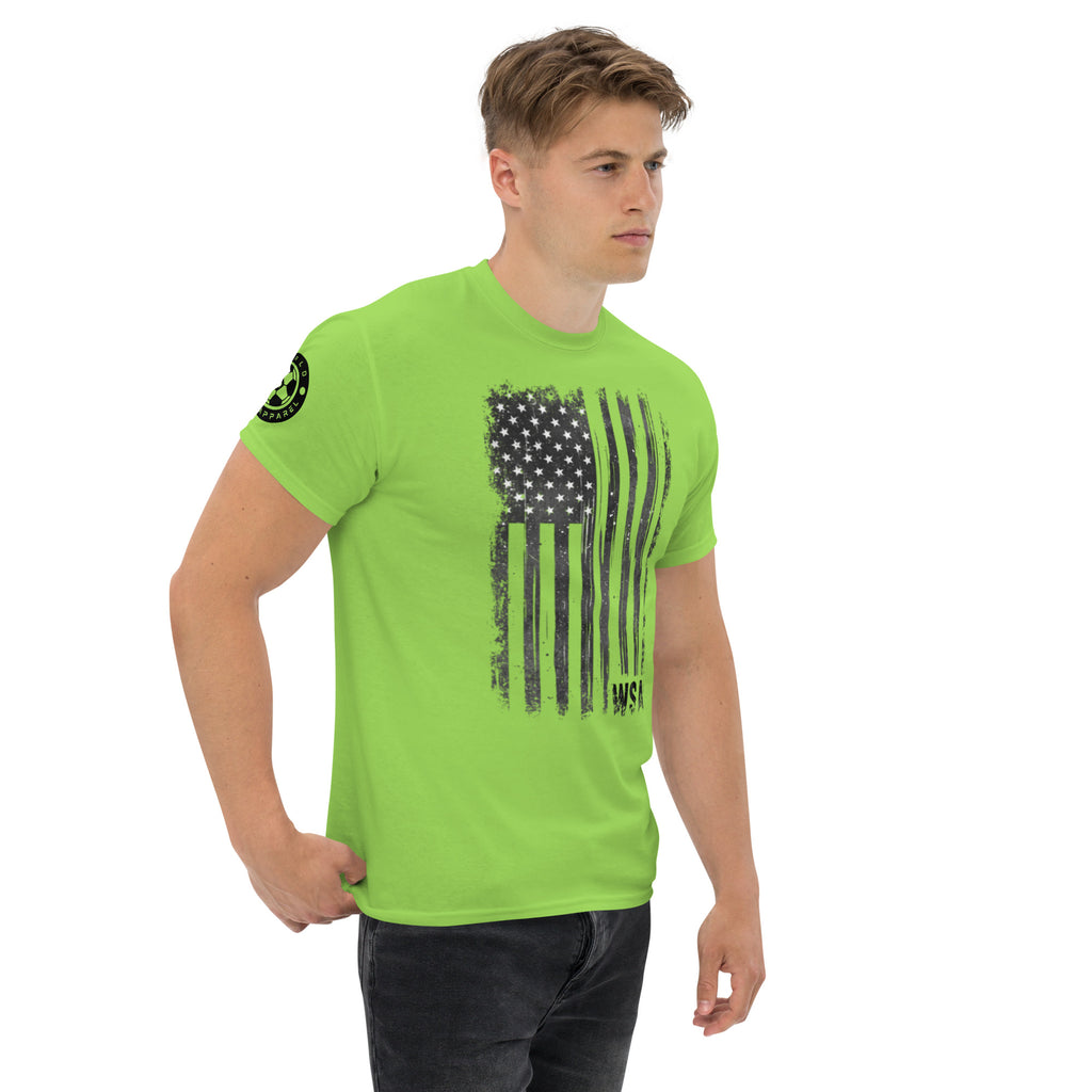 Man wearing a bright green t-shirt with a black graphic design on a white background