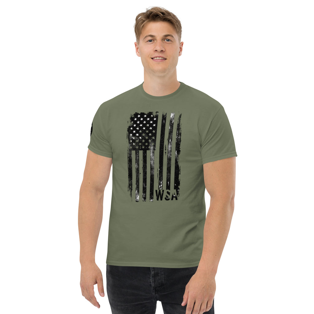Man wearing a green t-shirt with an American flag design on a white background