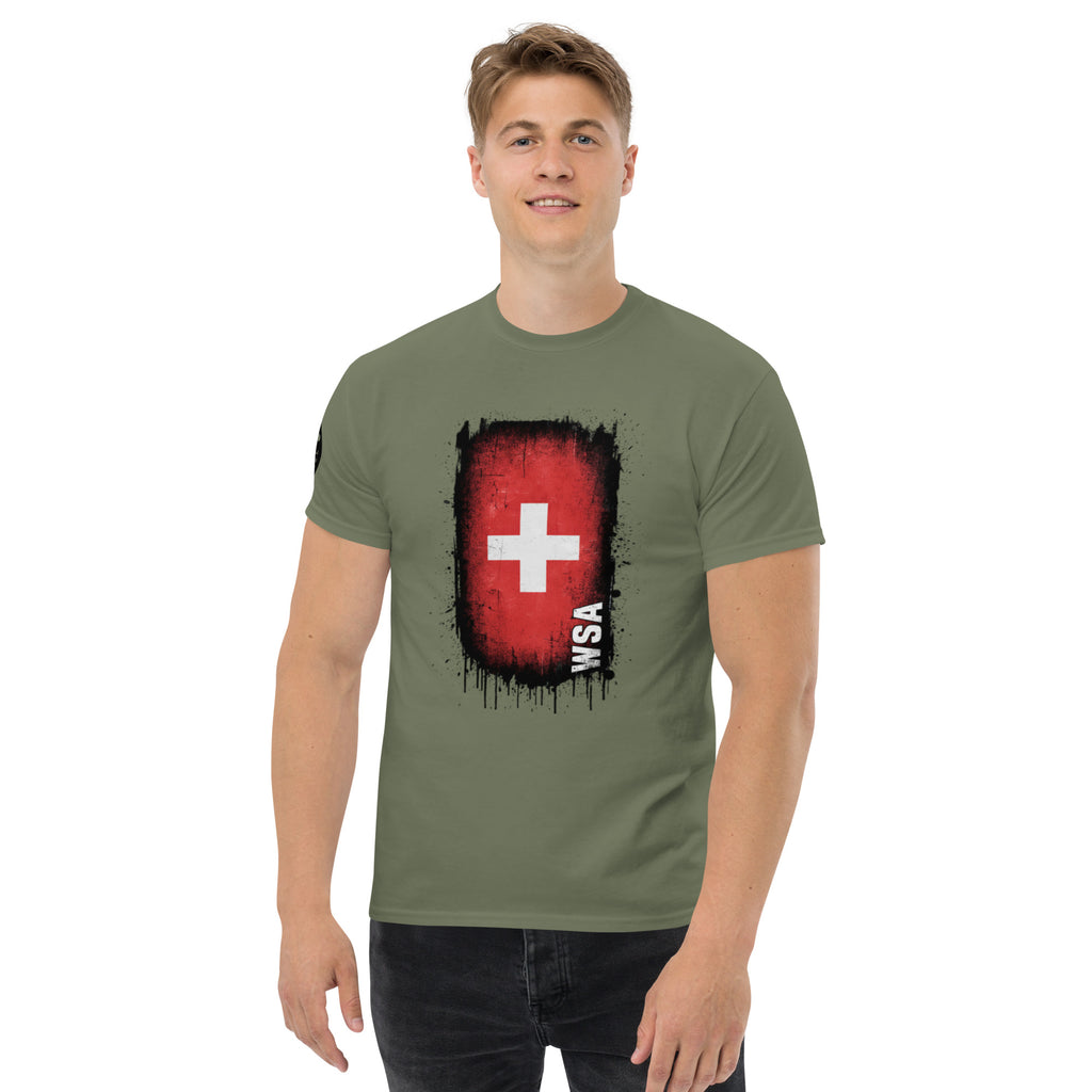 Man wearing a green t-shirt with a red and black graphic design on a white background