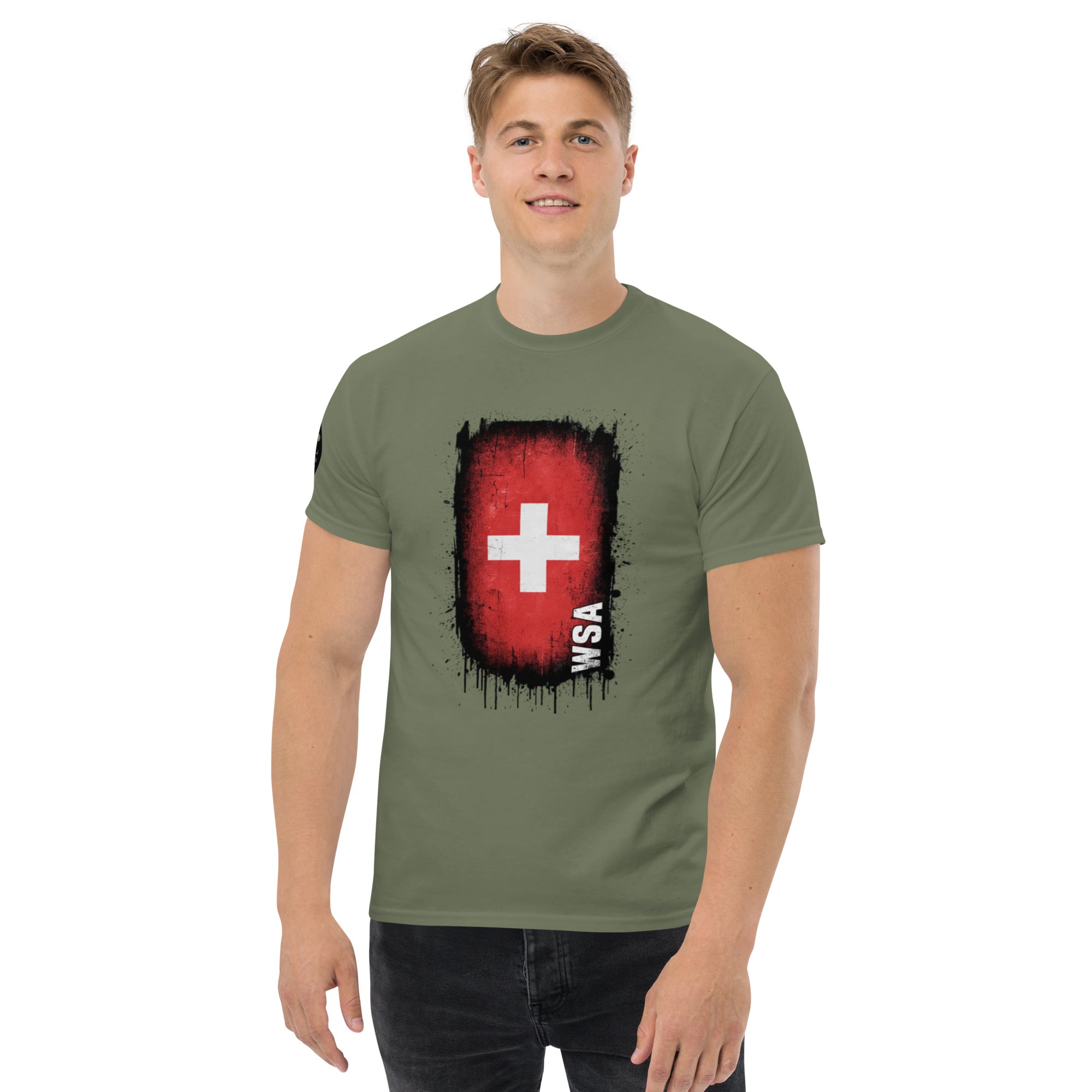 Man wearing a green t-shirt with a red and black graphic design on a white background