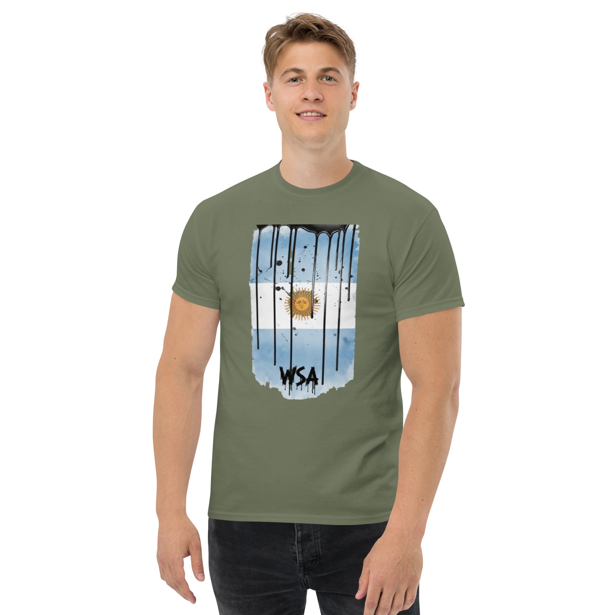 Person wearing a green t-shirt with a graphic design on a white background