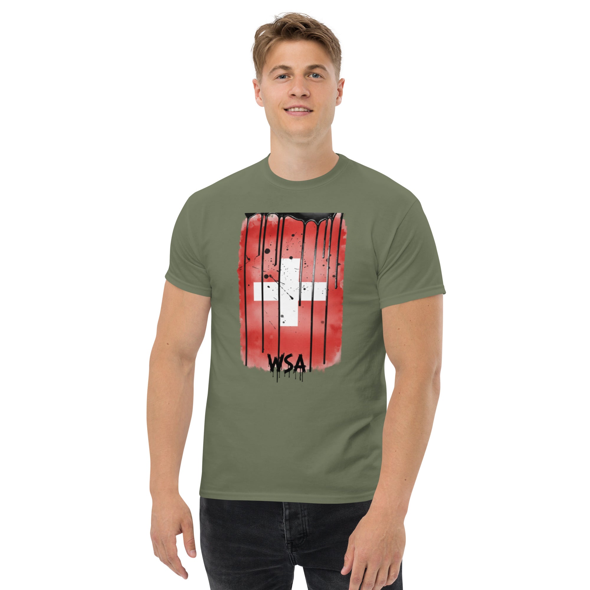 Man wearing a green t-shirt with a red and white graphic design on a white background