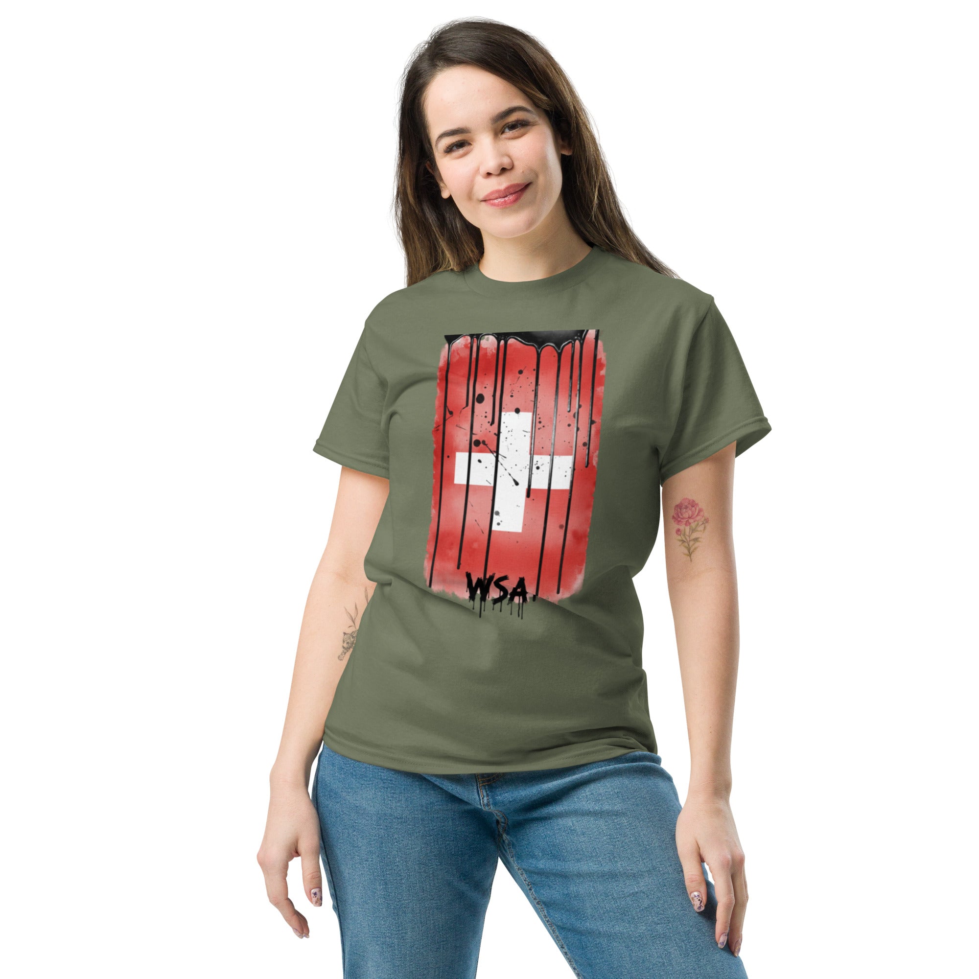 Woman wearing a green t-shirt with a red and white graphic design on a white background