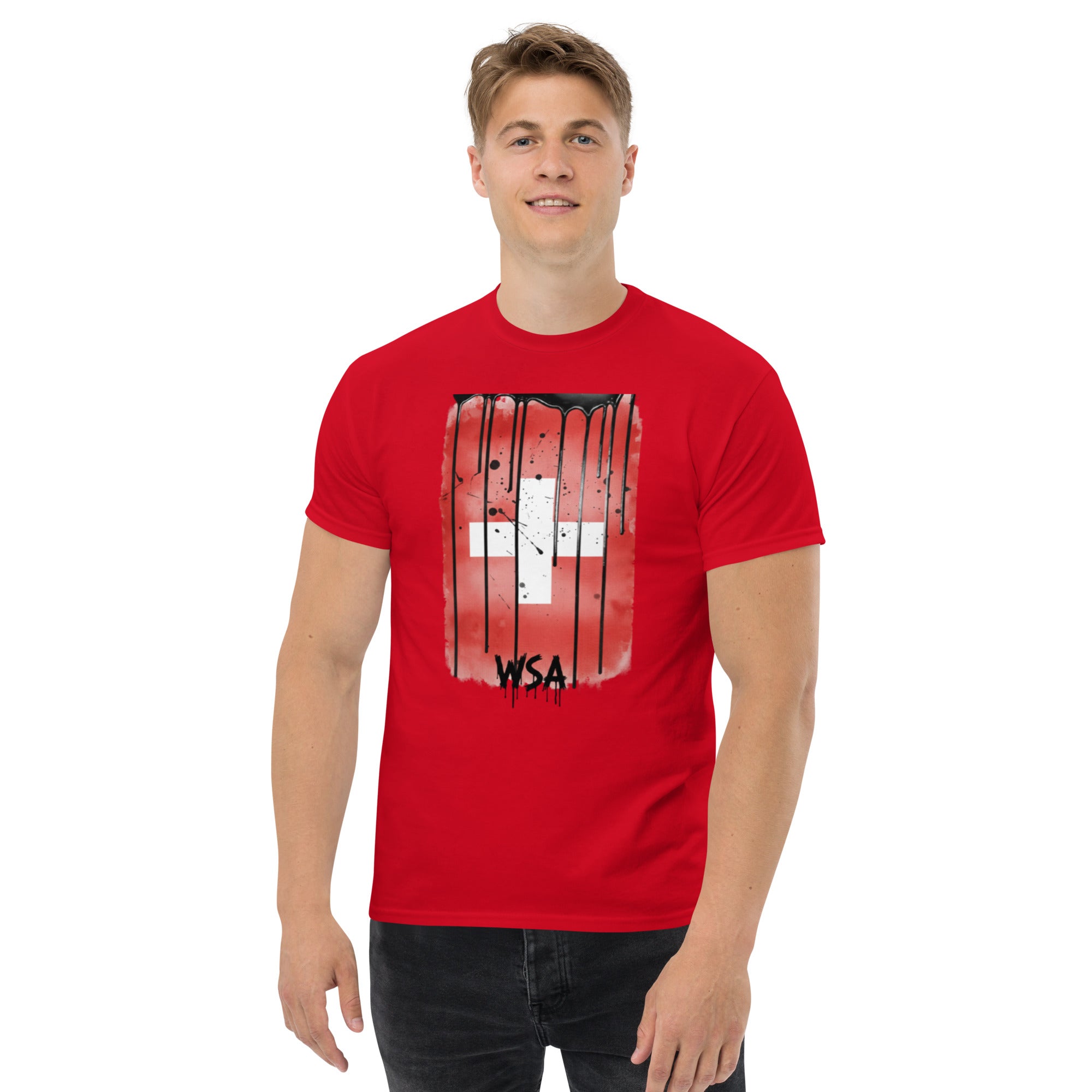 Man wearing a red t-shirt with a graphic design on a white background