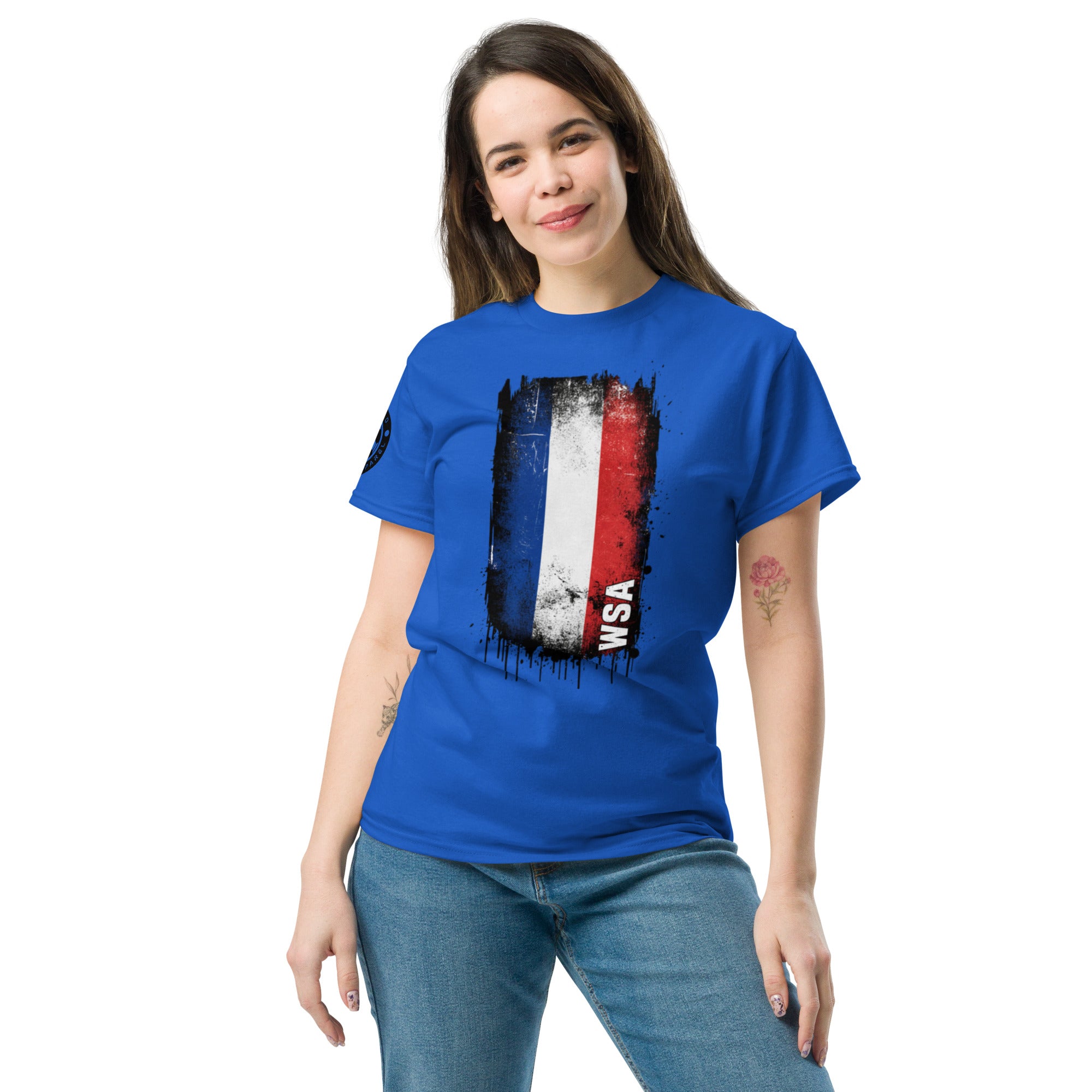 Woman wearing a blue t-shirt with a graphic design on a white background