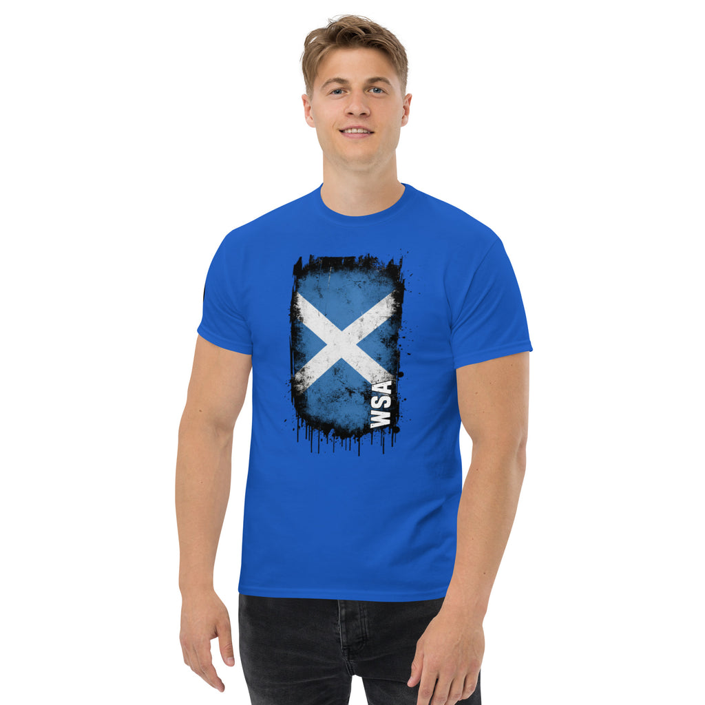 Man wearing a blue t-shirt with a Scottish flag design on a white background