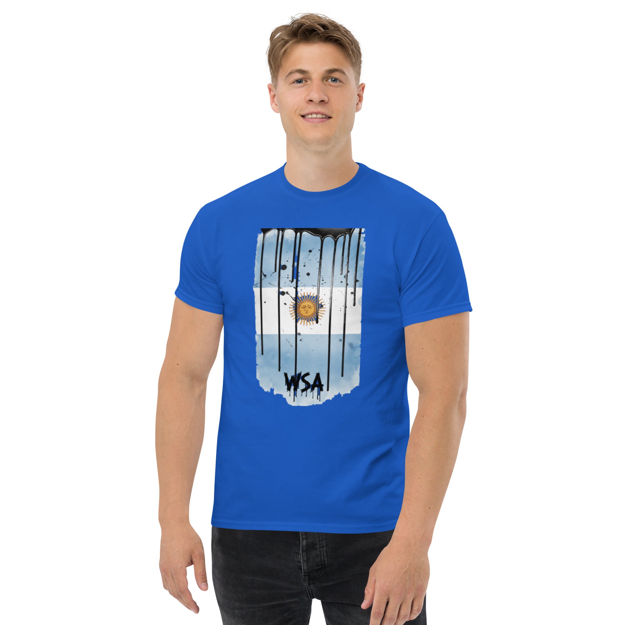Person wearing a blue t-shirt with a graphic design on a white background