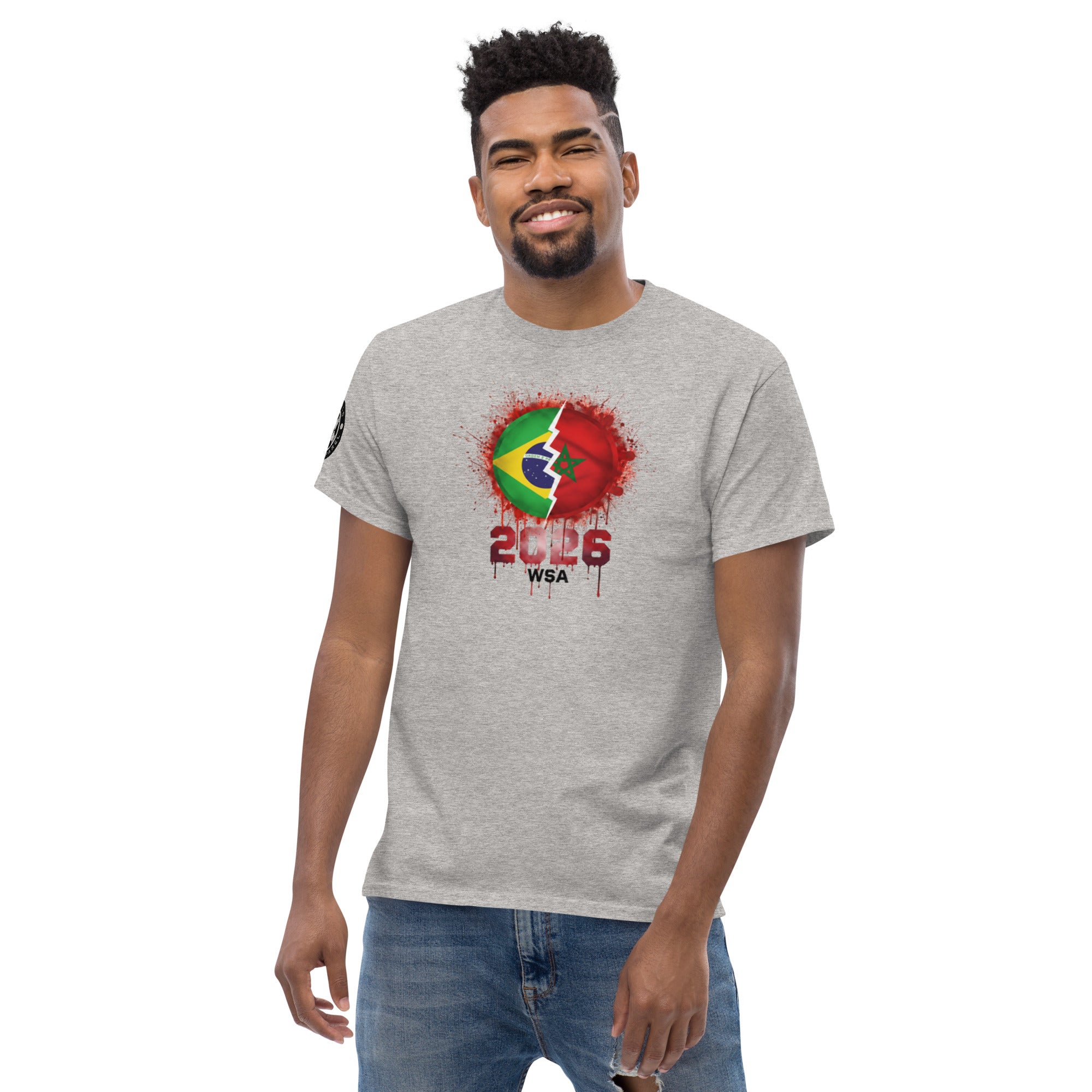 Man wearing a gray t-shirt with a colorful graphic design on a white background