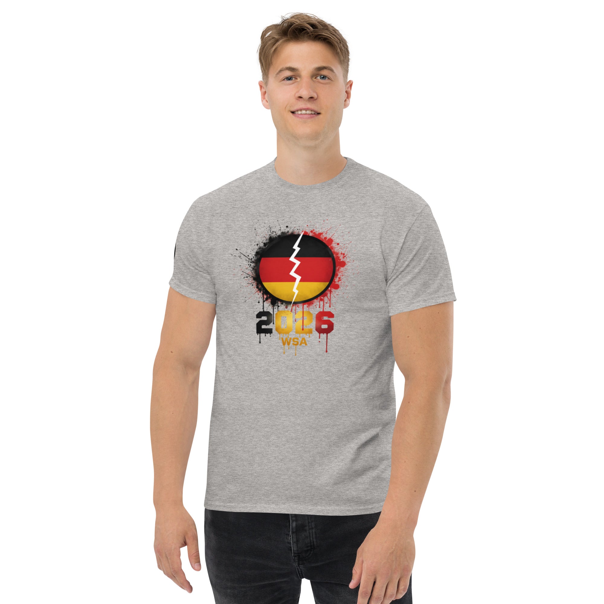 Person wearing a gray t-shirt with a design featuring the number 2016 and text on a white background