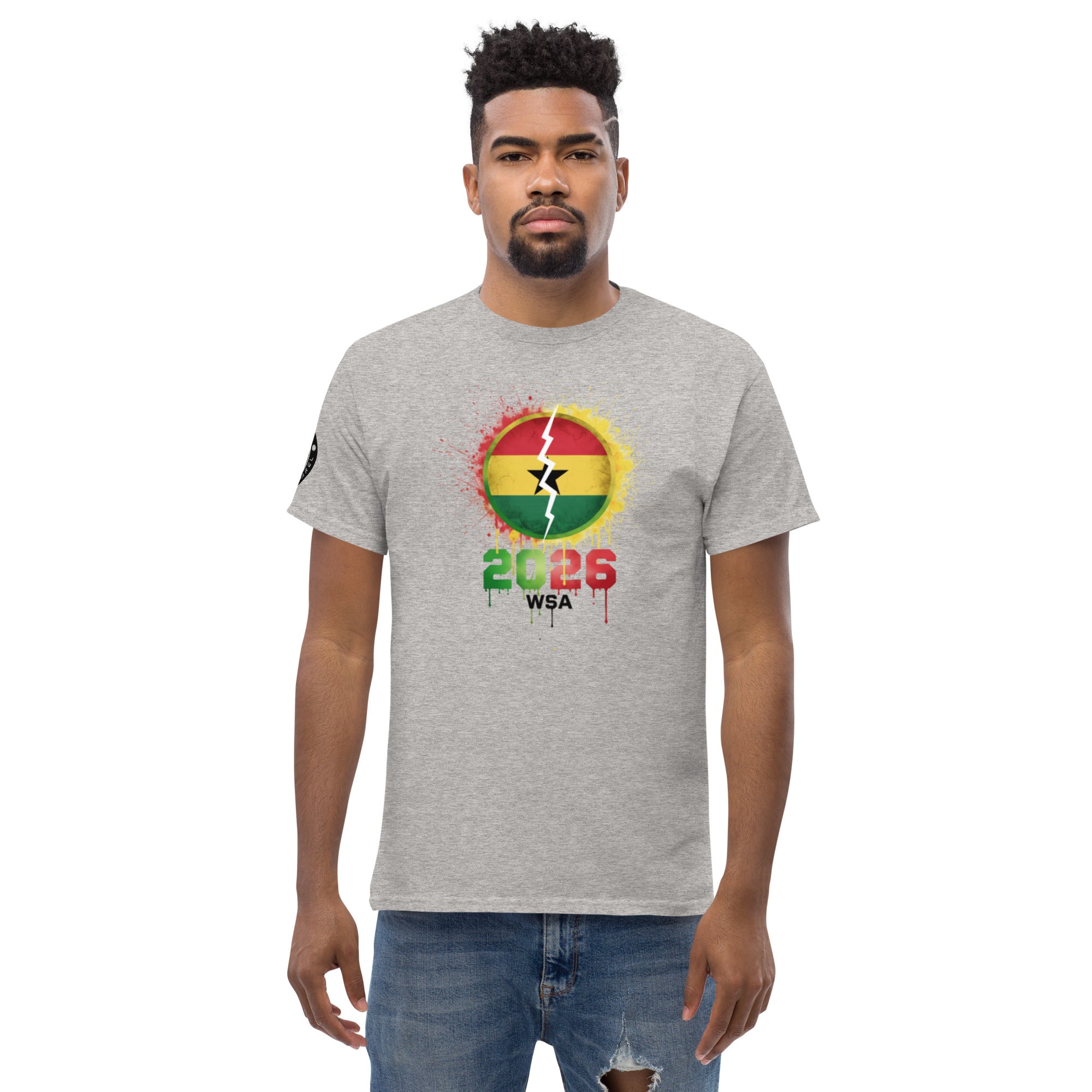 Man wearing a gray t-shirt with a colorful graphic design on a white background