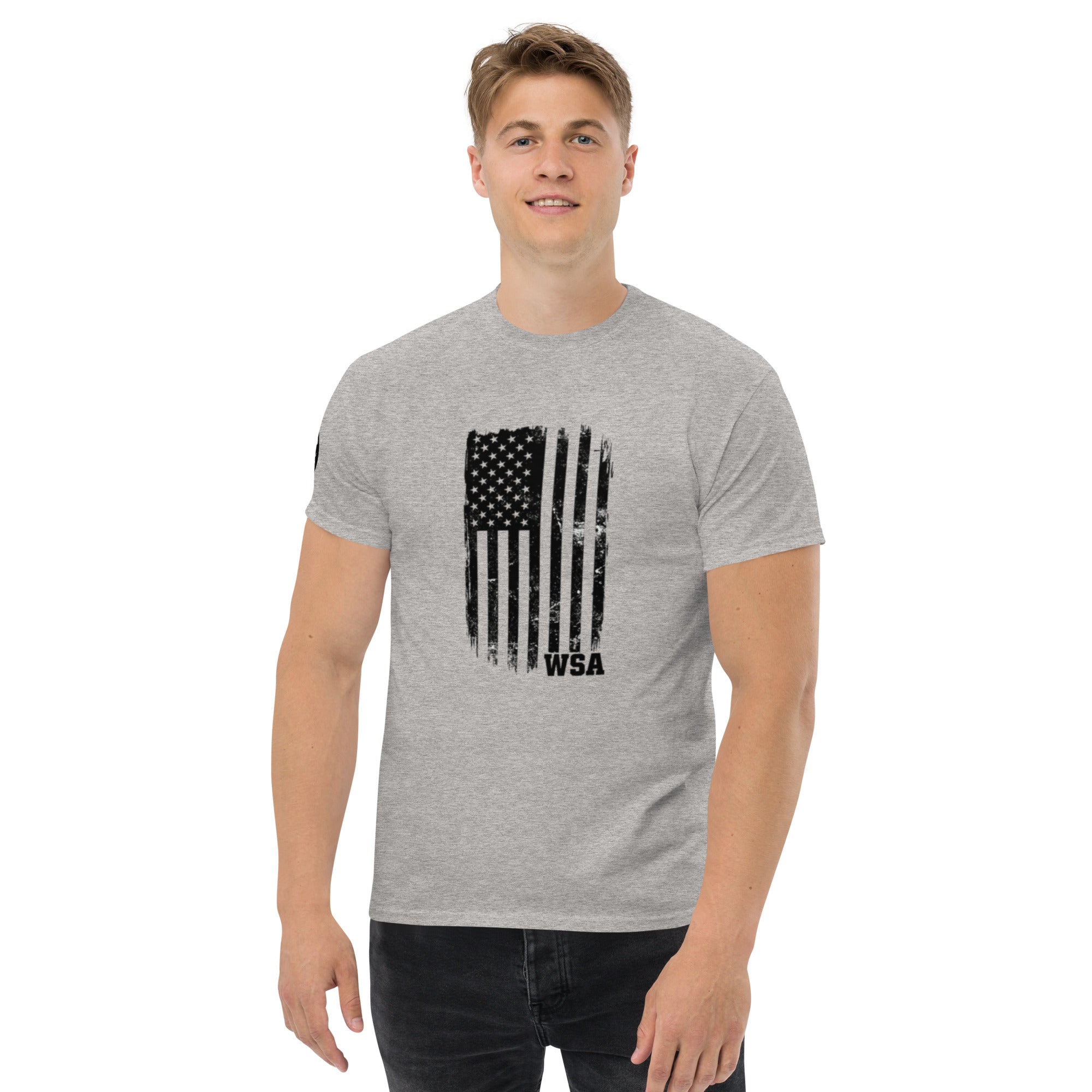 Man wearing a gray t-shirt with an American flag design on a white background