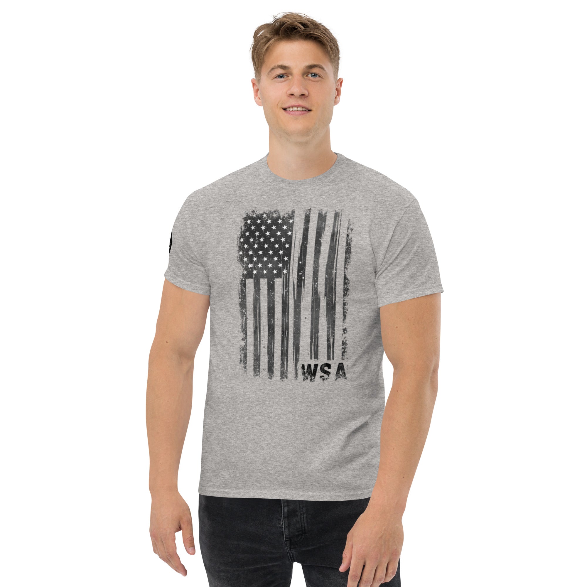Man wearing a gray t-shirt with an American flag design on a white background