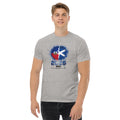 Person wearing a gray t-shirt with a graphic design on a white background