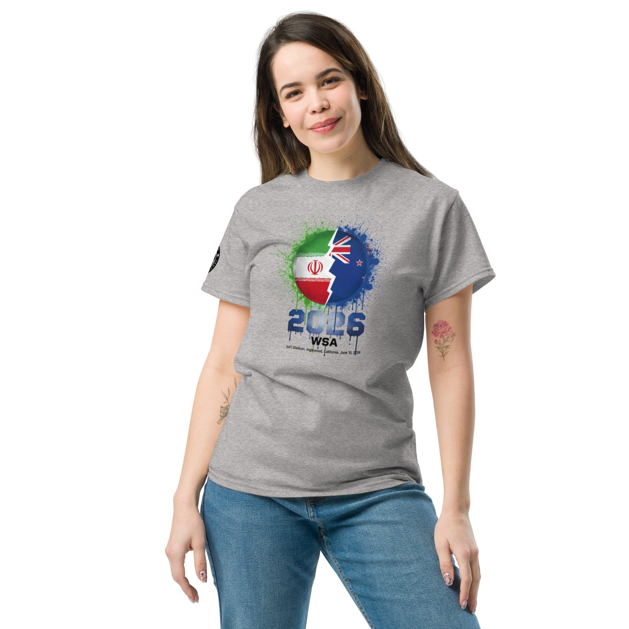 Woman wearing a gray t-shirt with a colorful design and text on a white background