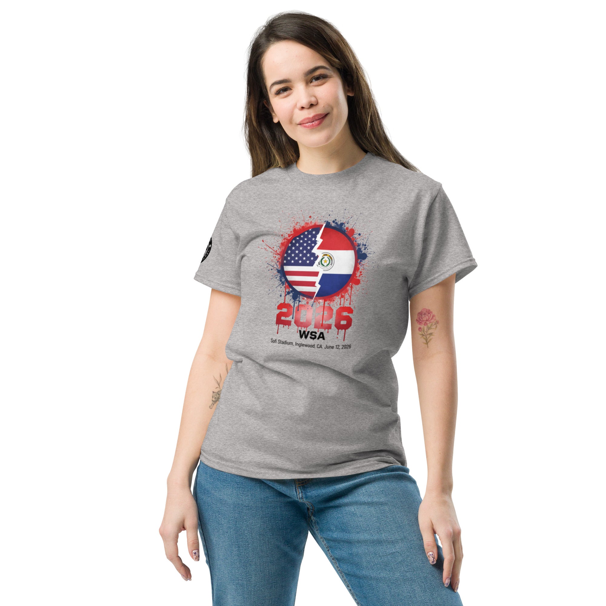 Woman wearing a gray t-shirt with a graphic design on a white background