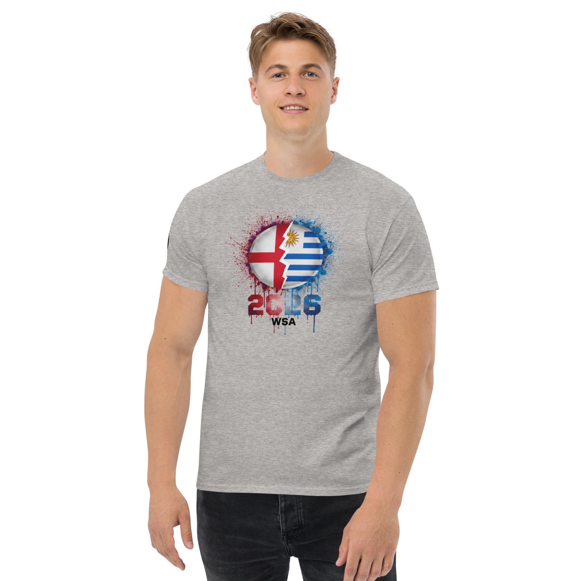 Man wearing a gray t-shirt with a colorful graphic design on a white background