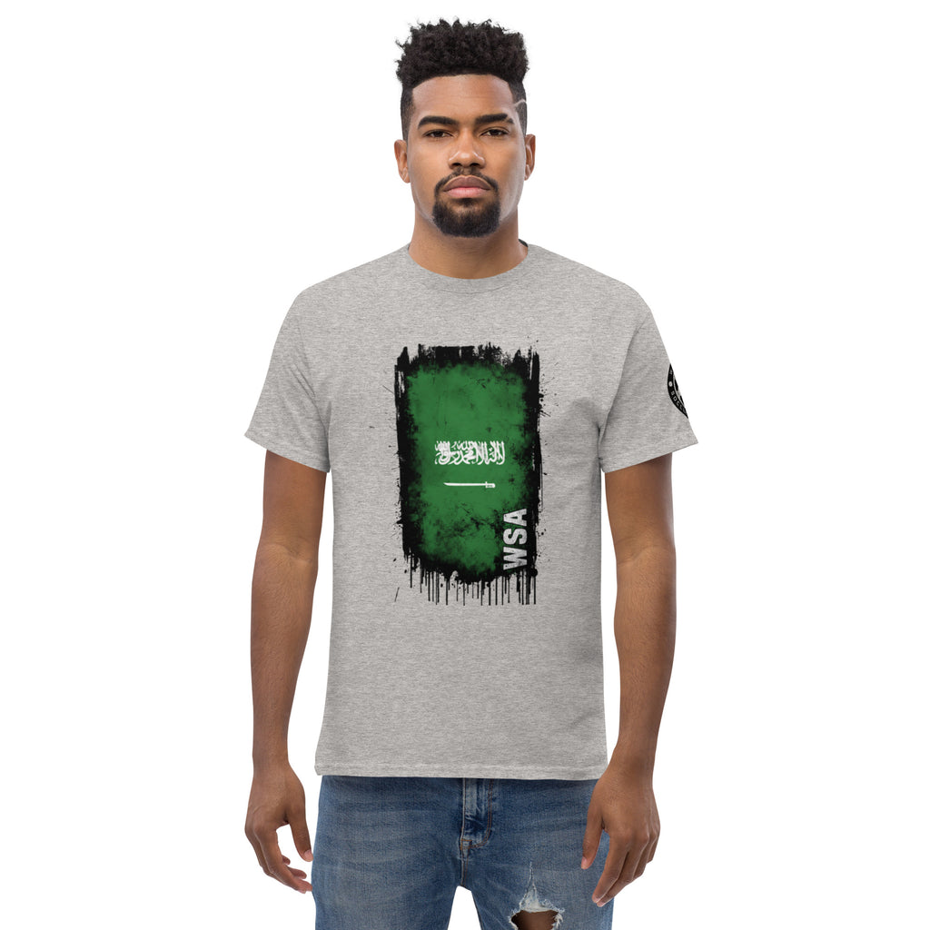 Man wearing a gray t-shirt with a green and black graphic design on a white background