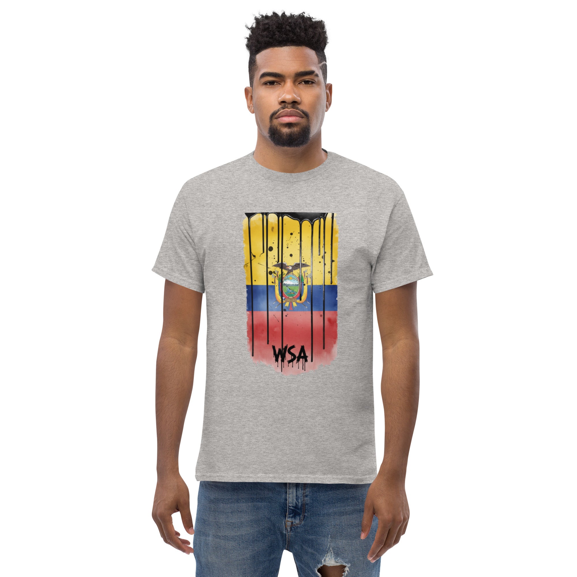 Man wearing a gray t-shirt with a colorful graphic design on a white background