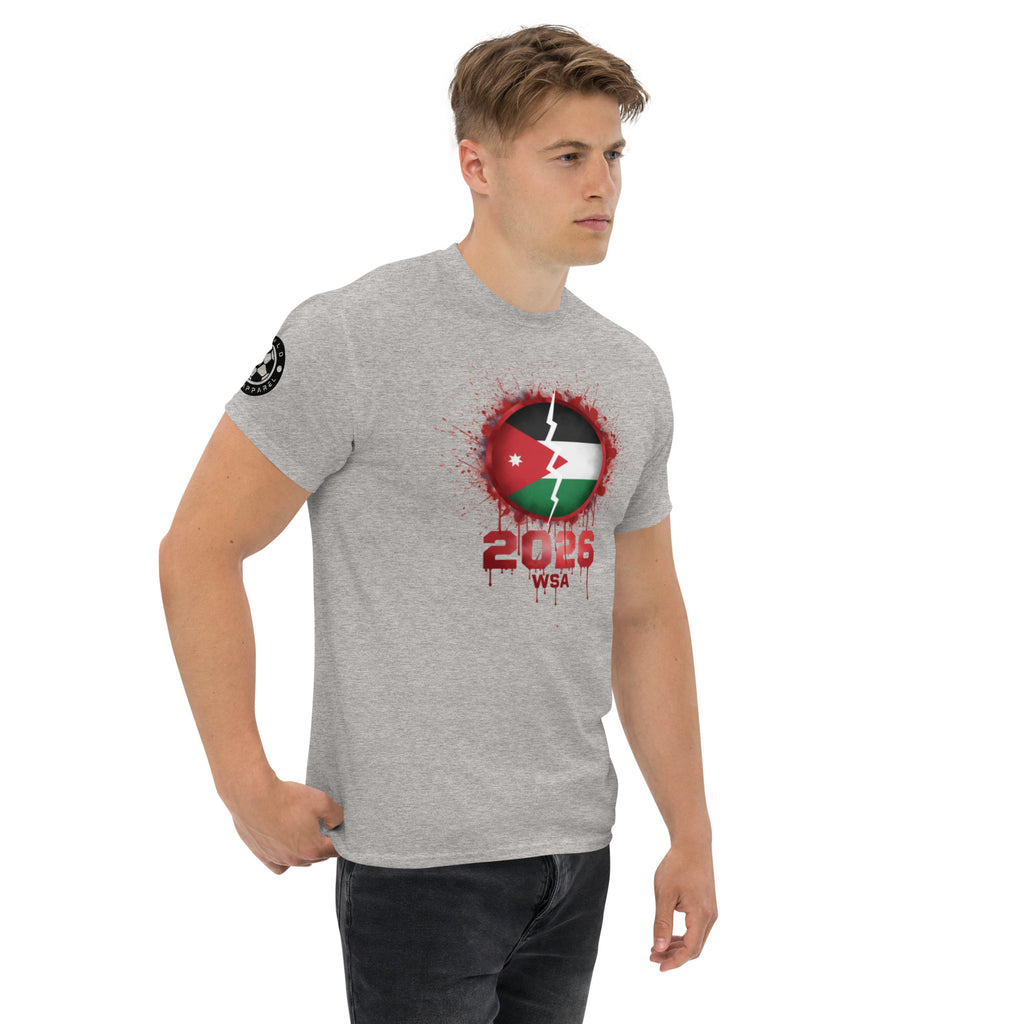 Man wearing a gray t-shirt with a graphic design on a white background