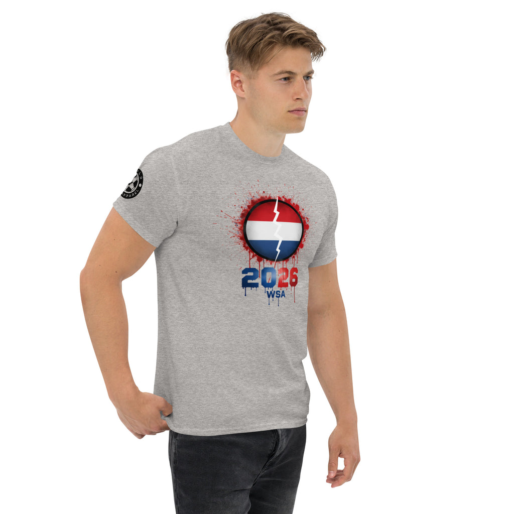 Man wearing a gray t-shirt with a graphic design on a white background