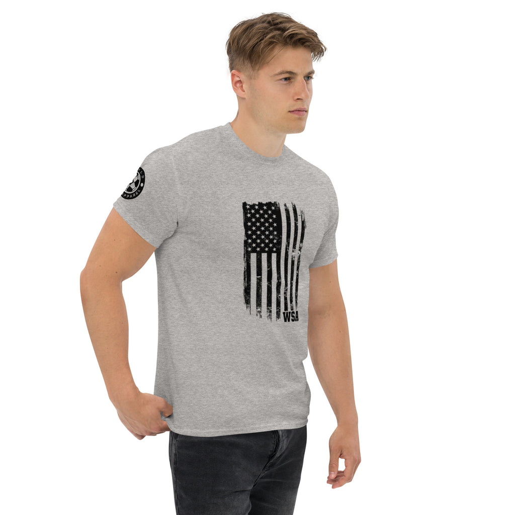 Man wearing a gray t-shirt with an American flag design on a white background
