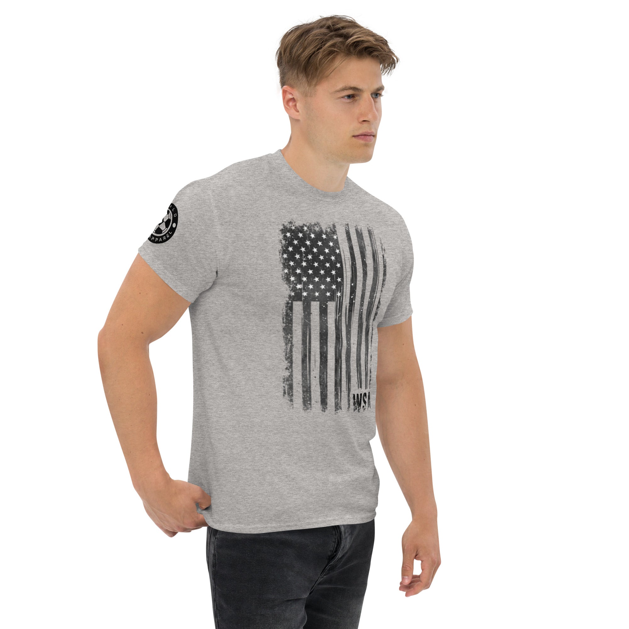 Man wearing a gray t-shirt with an American flag design on a white background