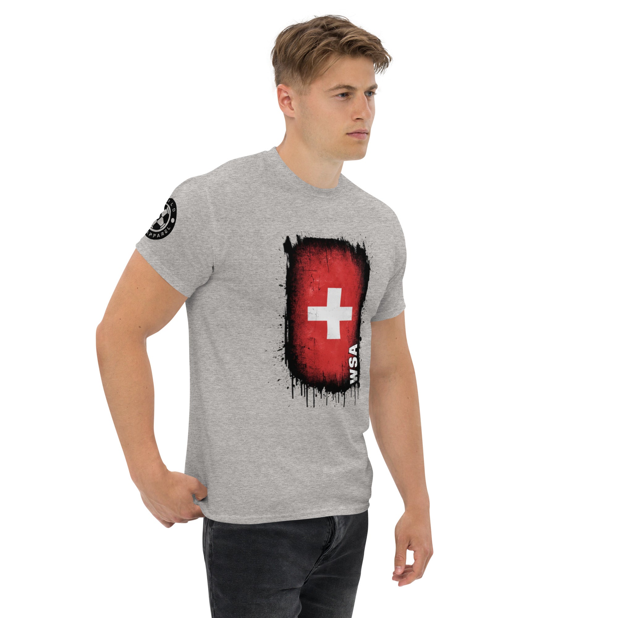 Man wearing a gray t-shirt with a red and black graphic design on a white background