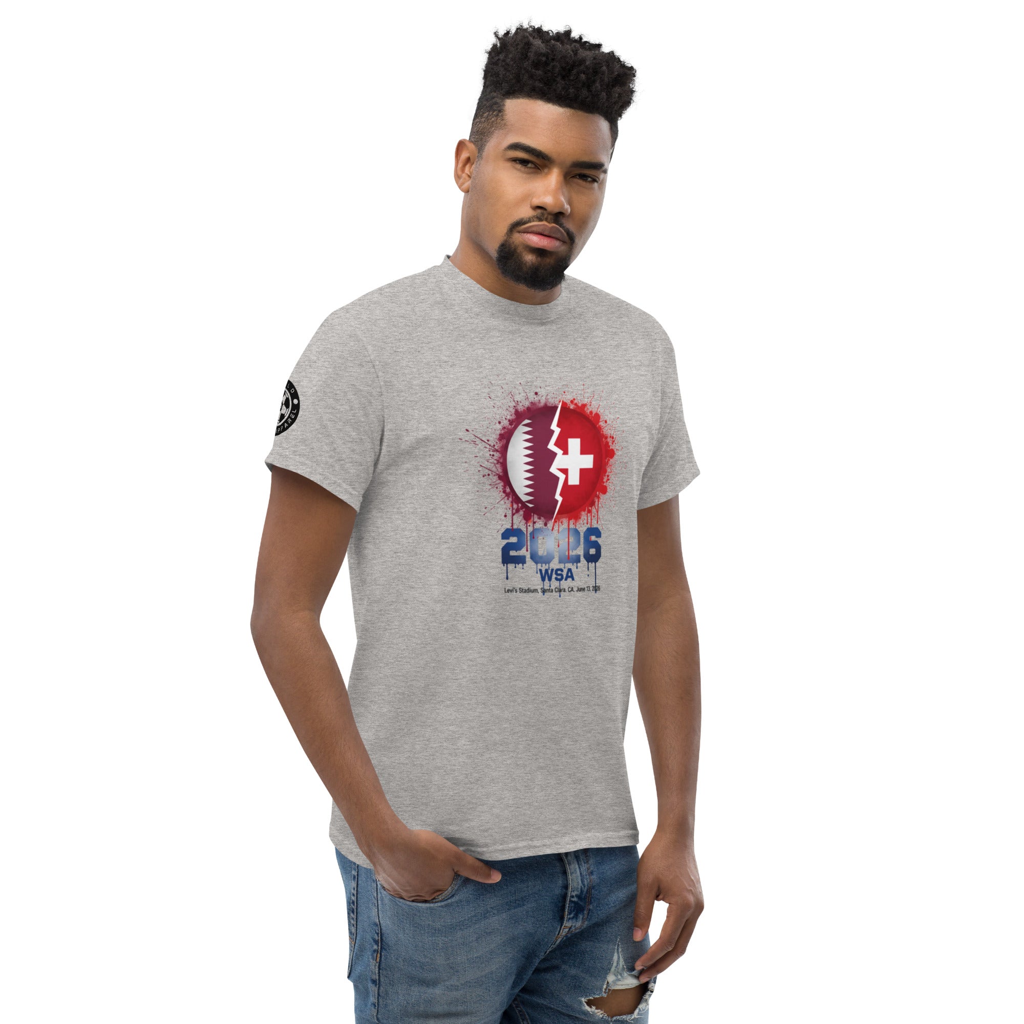 Man wearing a gray t-shirt with a graphic design on a white background