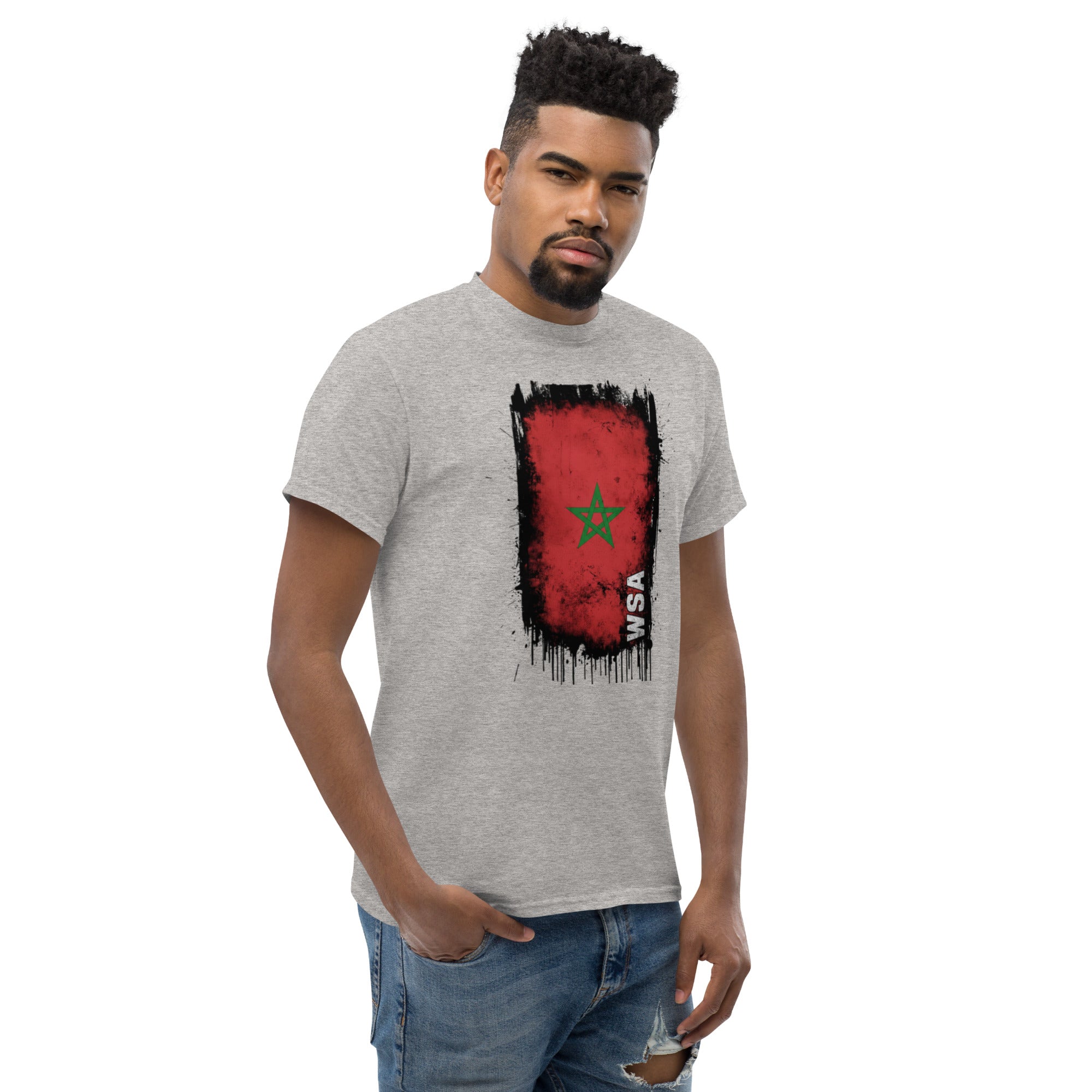 Man wearing a gray t-shirt with a red and black graphic design on a white background