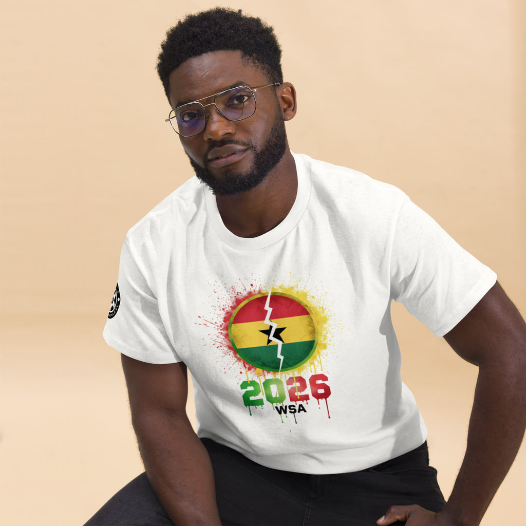 Man wearing a white t-shirt with a colorful design and text on a beige background
