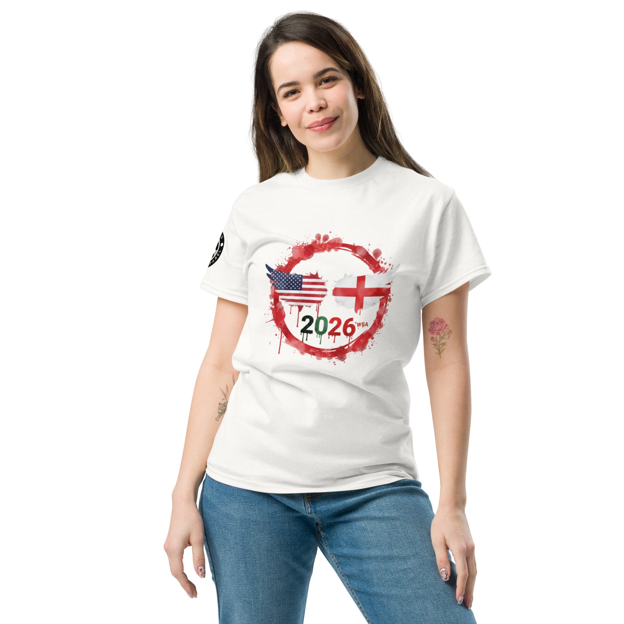 Woman wearing a white t-shirt with a design featuring the American and British flags and the year 2026.