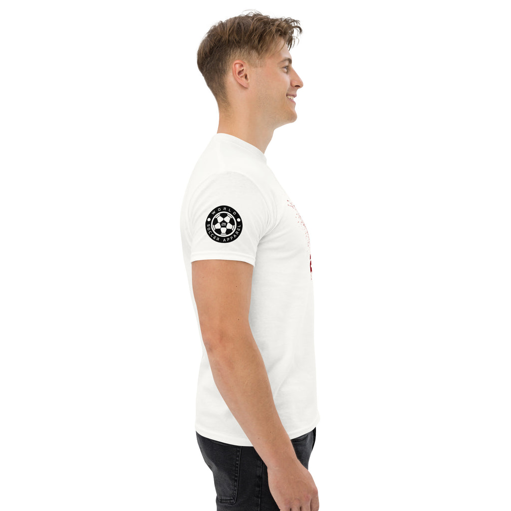Man wearing a white t-shirt with a black circular logo on a white background