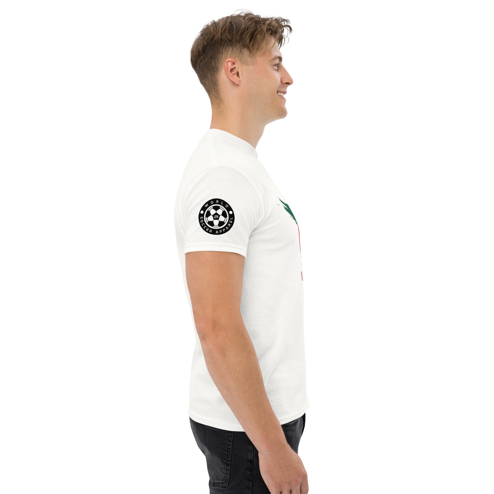 Man wearing a white t-shirt with a logo on the sleeve against a white background