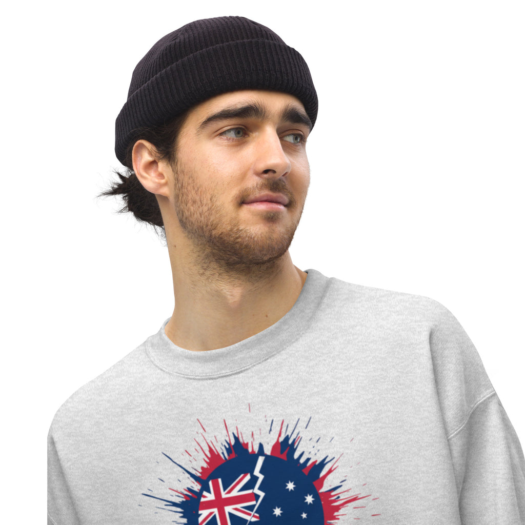 Man wearing a gray sweatshirt with a graphic design on a white background